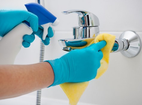 Local team cleaning a multi-storey property exterior in SW8