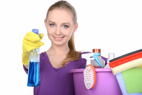 Cleaner working in a local SW8 flat near the river